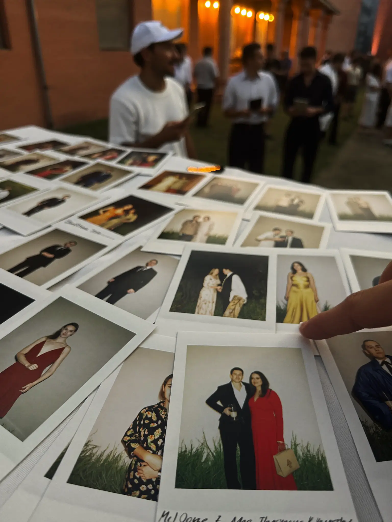 Guests scanning a QR code to add photos to a shared album